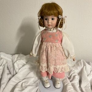 Vintage Porcelain Collectible Doll with display stand